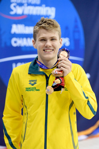 Brilliant Bronze: Tim Hodge proudly shows off his bronze medal.